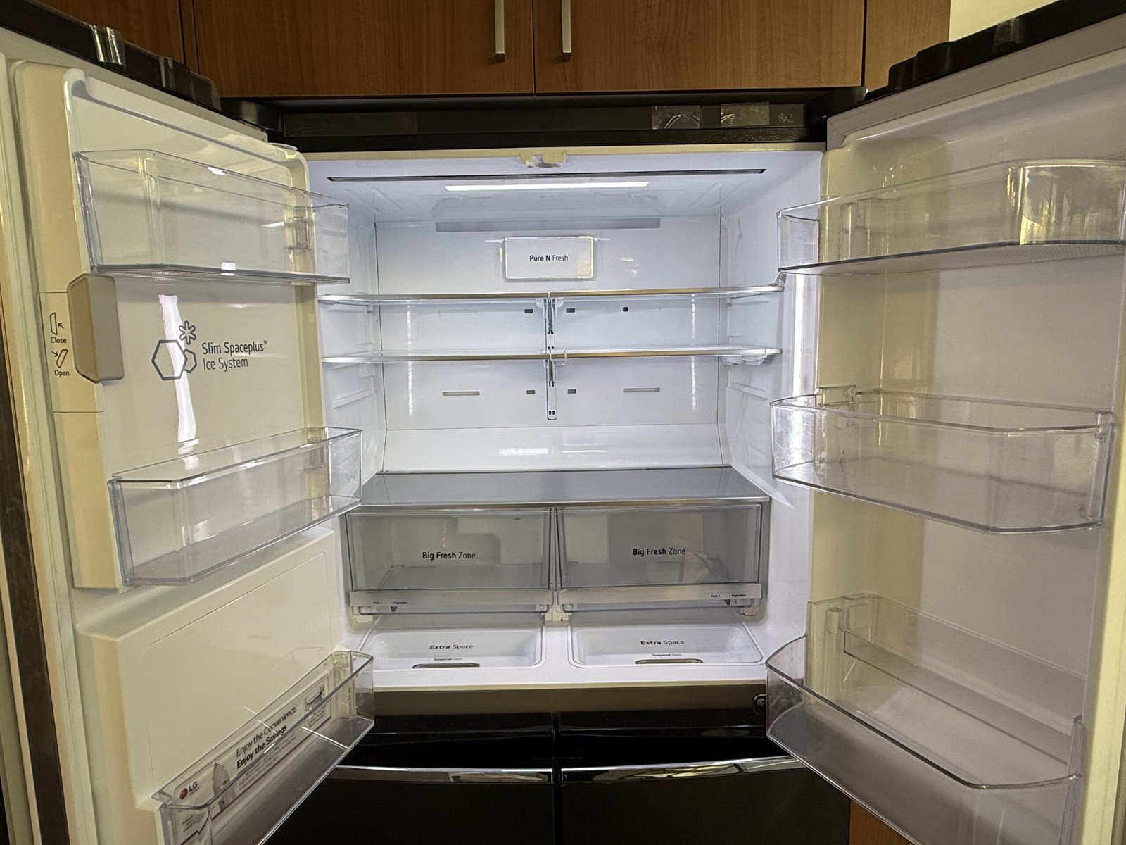 Empty, sanitised fridge interior after deep cleaning Content